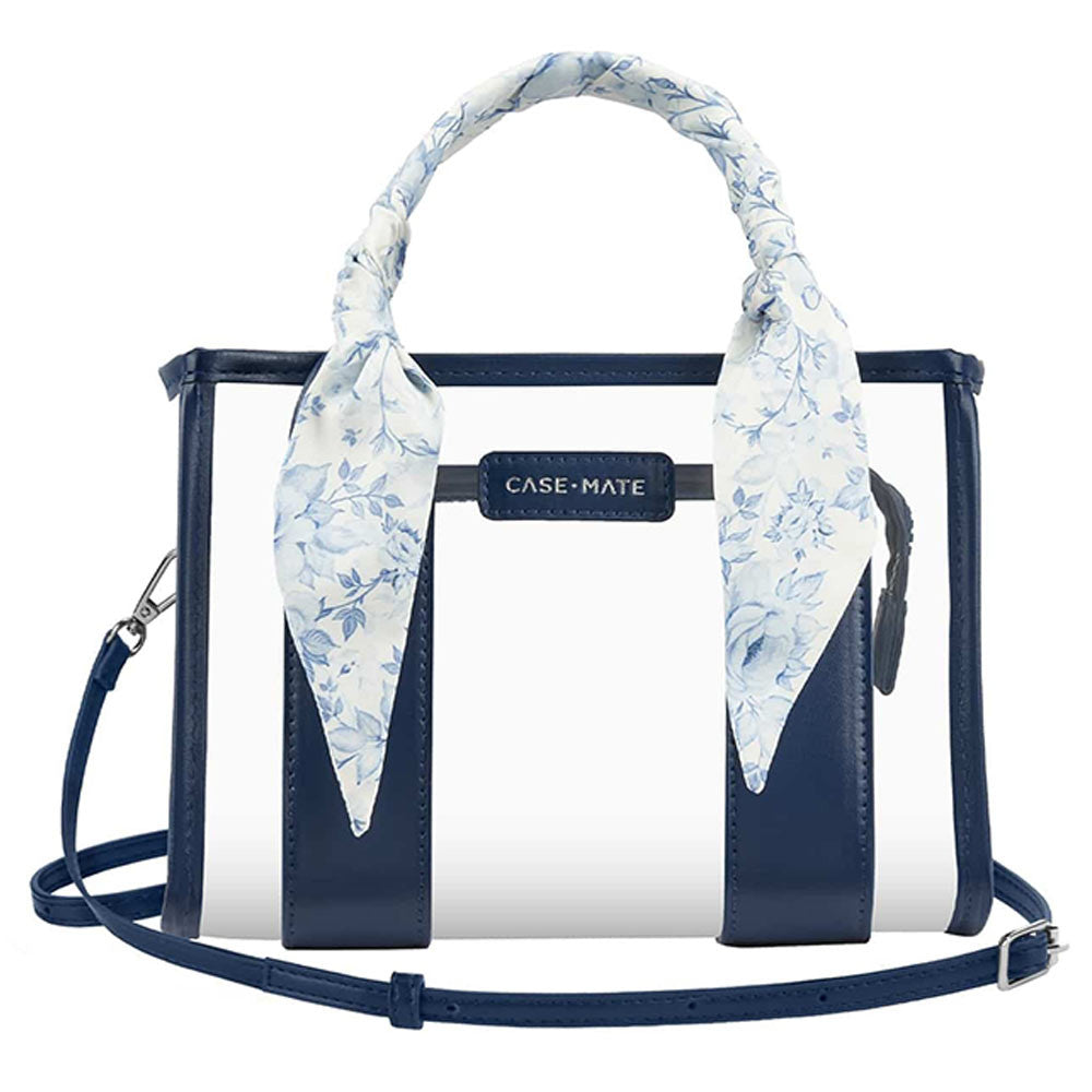 Case-Mate Jelly Stadium Bag Something Navy Twilly. Clear bag with navy blue trim and a blue floral scarf handle.