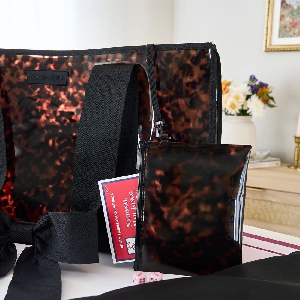 Case-Mate Mahjong Jelly Tote Set, Tortoiseshell Bow. Stylish clear tote with matching pouch, Mahjongg card, and pink dice.